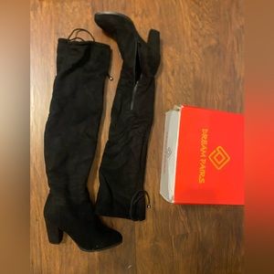 Dream Pairs OTK black heeled boots that tie in the back. Size 9.